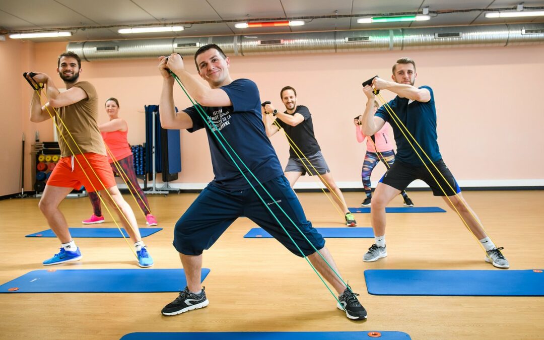 A group of enthusiastic sports enthusiasts engaging in invigorating workouts at Espace Nautique de la Grande Garenne, a dynamic sports complex near La Maison Saint Nicolas.